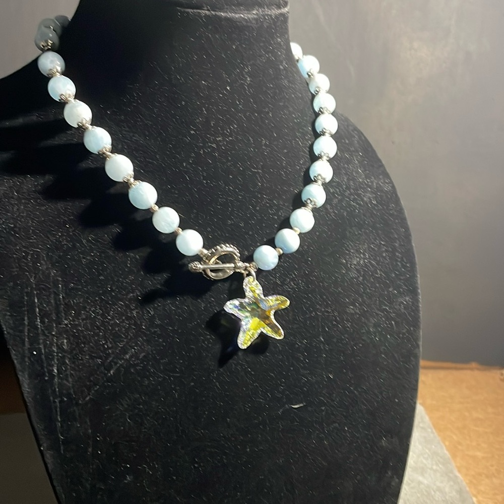 Gorgeous designer created Aquamarine Crystal Starfish and Sterling necklace.